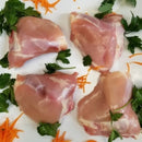 Boutique Butcher Skinless Chicken Thighs (with bone) (2.5 lbs - 3.5 lbs)